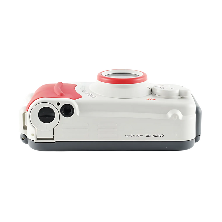 Side profile of compact white Canon Sure Shot WP-1 waterproof camera with red top cap and textured grip from ClubCamera.com
