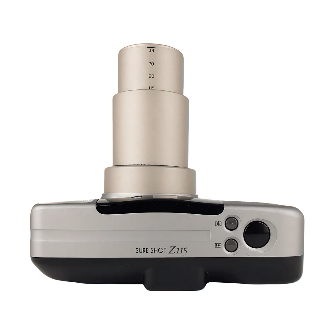 Top view Canon Sure Shot Z115 showing engraved focal length markings and control buttons