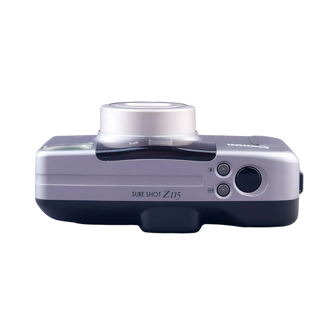 Side profile Canon Sure Shot Z115 emphasizing compact design and magnetic label