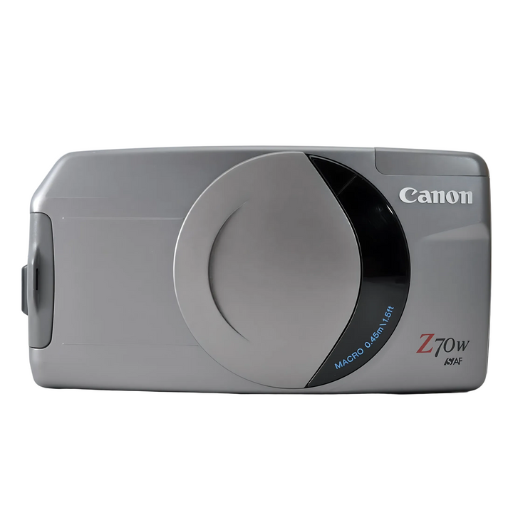 Top-down view of Canon Z70W compact body highlighting matte finish and curved lens cover design