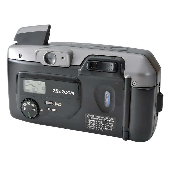 Canon Sure Shot Z70W rear angle showing mode dial icons for portrait macro night and raised flash unit