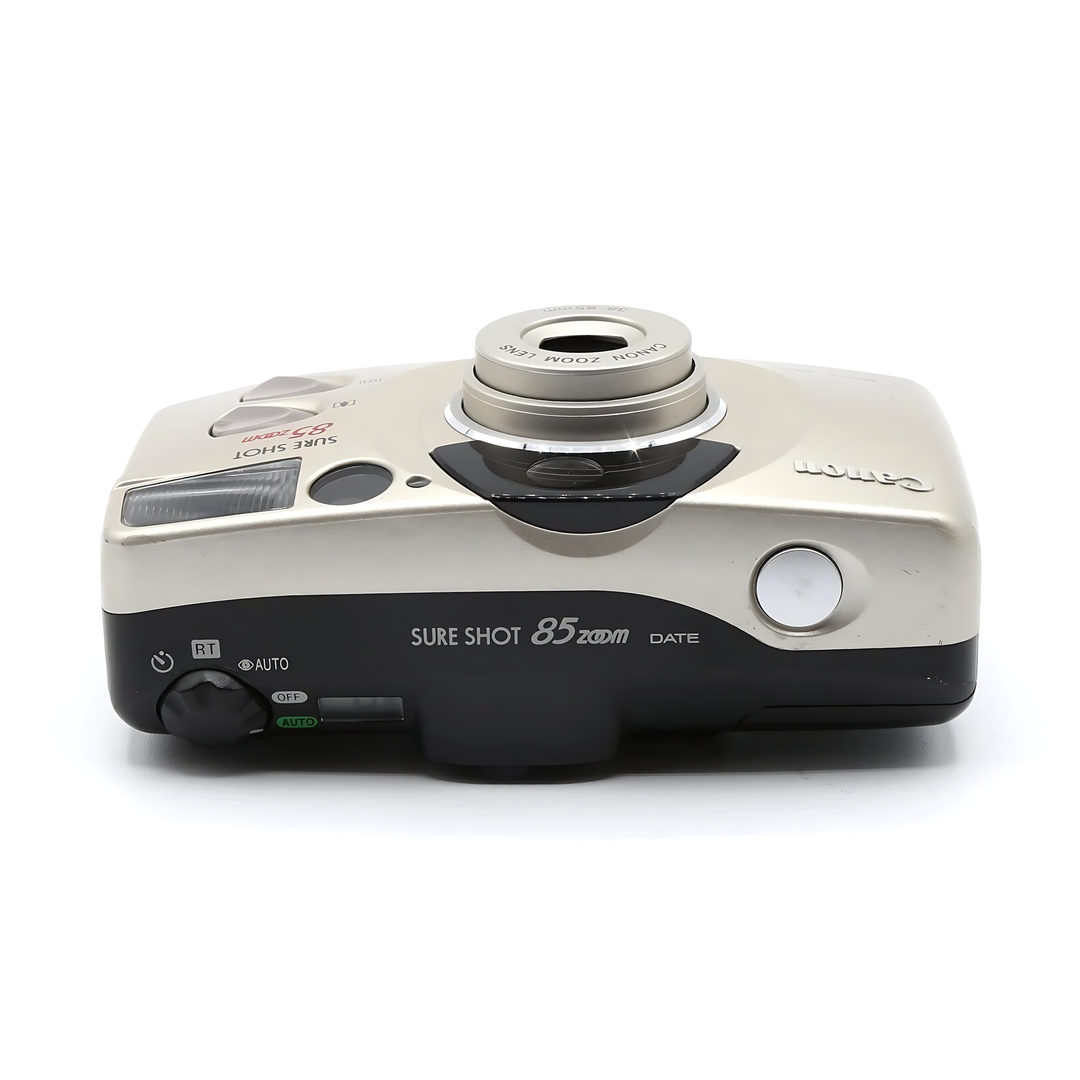 Front angled shot of Canon Sure Shot 85 Zoom Date highlighting 38-85mm lens ring and branding at ClubCamera.com