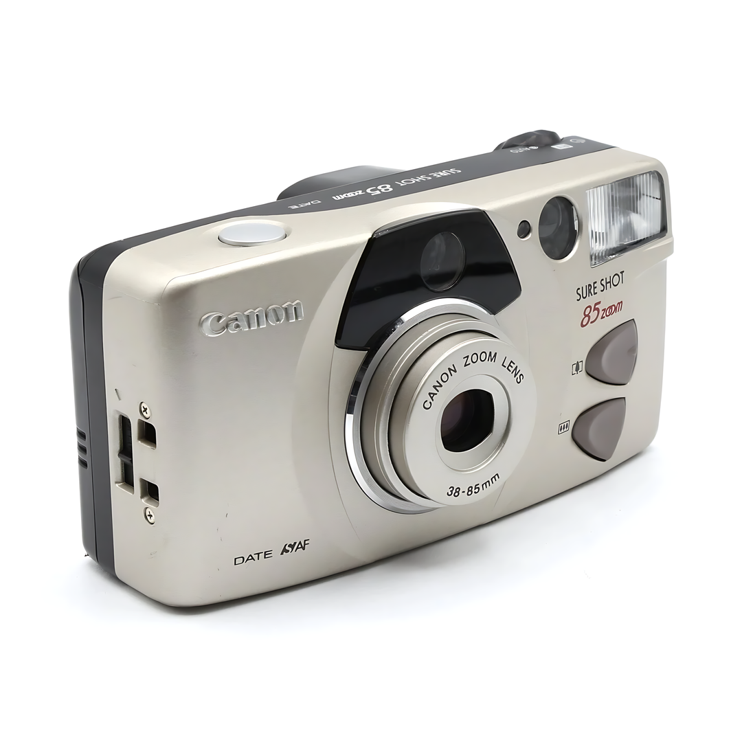 Beige Canon Sure Shot Zoom 85 Date 35mm film camera three-quarter view with brushed texture sold by ClubCamera.com