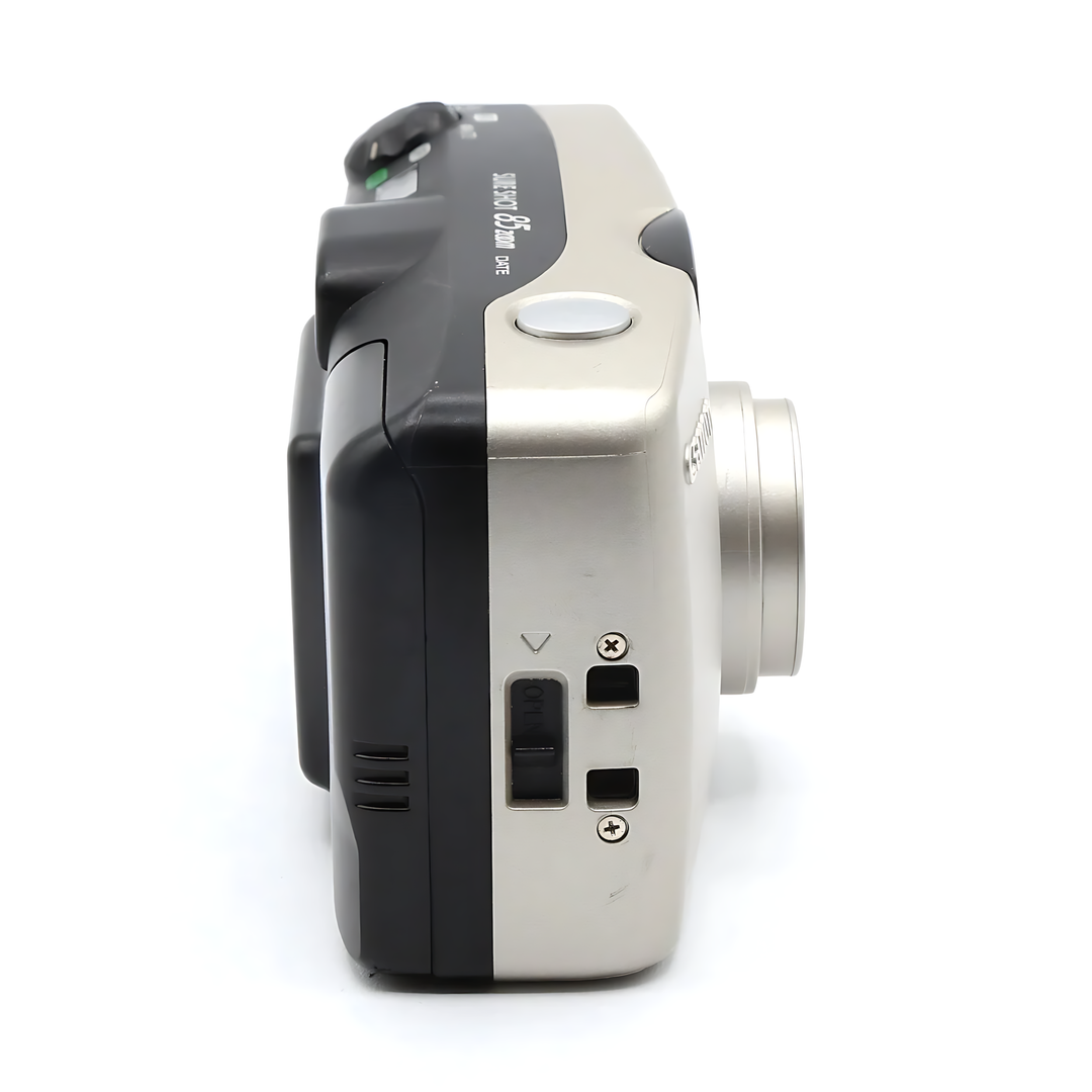 Canon Sure Shot Zoom 85 Date silver film camera side profile with textured grip and zoom lens at ClubCamera.com