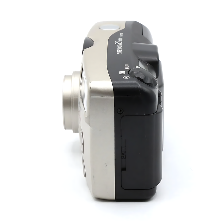 Canon Sure Shot 85 Zoom Date battery compartment and mode dial detail on silver film camera from ClubCamera.com