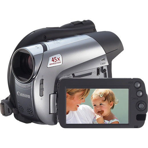 ClubCamera.com Canon VIXIA DC320 silver black DVD camcorder with 48x zoom and flip-out LCD screen showing family photo