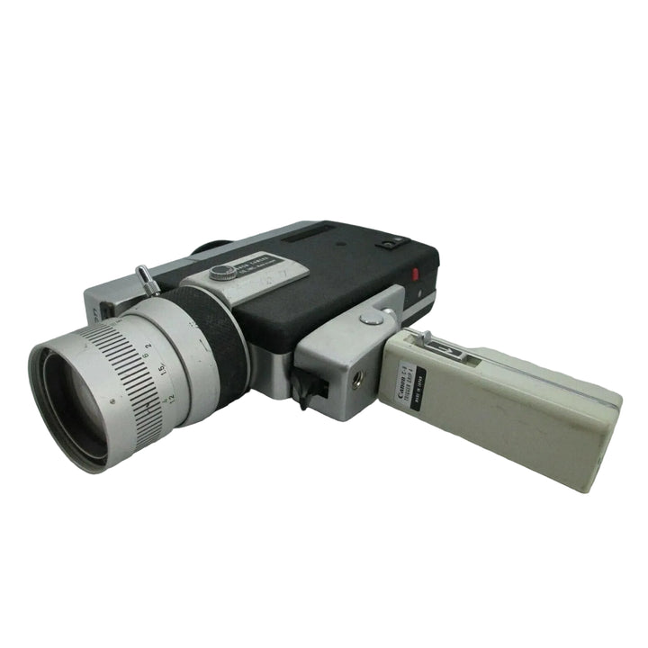 Canon Zoom 318 Super 8 camera with extended cream viewfinder grip showing ergonomic layout at ClubCamera.com