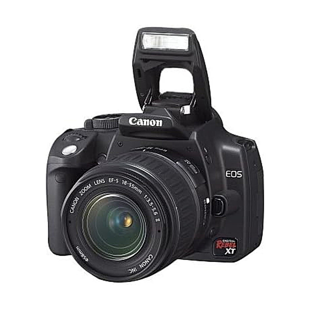 Front view of black Canon EOS Digital Rebel XT DSLR with raised flash and EF-S 18-55mm lens at ClubCamera.com
