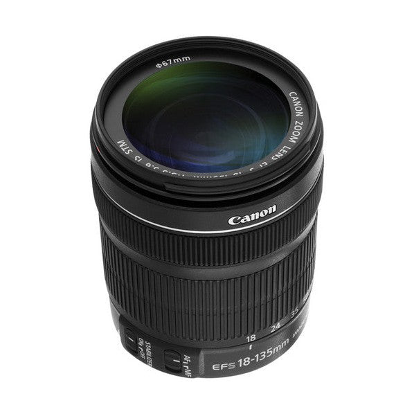ClubCamera top-down view of Canon EF-S 18-135mm lens highlighting multi-coated glass element and engraved rim text