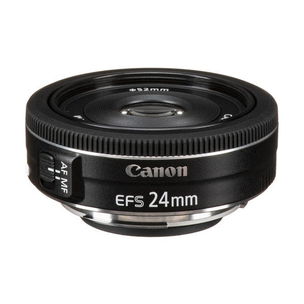 Canon EF-S 24mm f/2.8 STM pancake lens front-three-quarter angle showing AF/MF switch and logo at ClubCamera.com