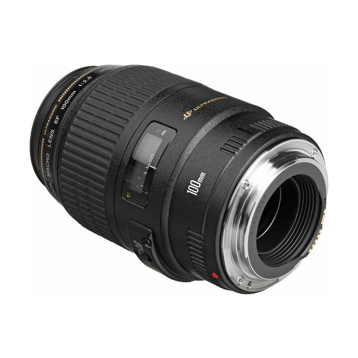 Rear angle of Canon EF 100mm f/2.8 Macro lens highlighting silver metal mount and red indicator dot sold by ClubCamera.com