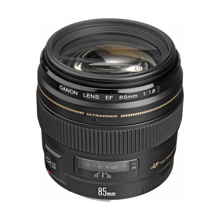 Front view of Canon EF 85mm f/1.8 USM prime lens showing AF/MF switch and distance scale at ClubCamera.com