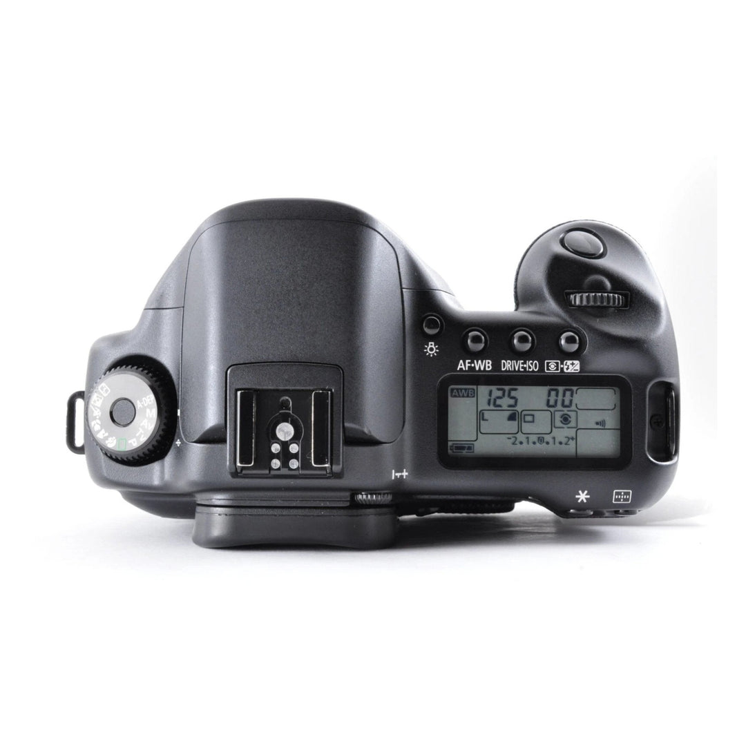 Top-down black Canon EOS-10D showing mode dial settings and LCD panel at ClubCamera.com