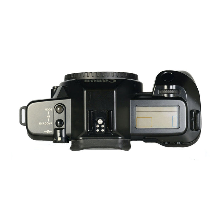 Top control layout of black Canon EOS 620 film camera with mode dial and LCD screen sold by ClubCamera.com