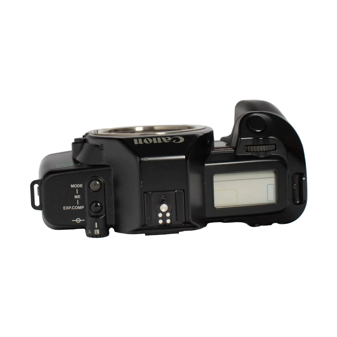 Top plate of Canon EOS 630 35mm film camera with hot shoe and mode dial at ClubCamera.com
