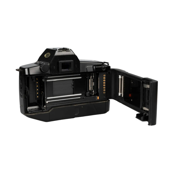 Open back panel of Canon EOS 650 showing 35mm film loading mechanism at ClubCamera.com