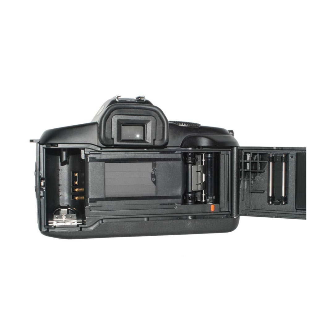 Open back view of black Canon EOS 850 SLR revealing film spools and transport mechanism at ClubCamera.com