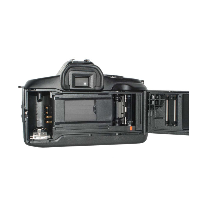 Open back view of black Canon EOS 850 SLR revealing film spools and transport mechanism at ClubCamera.com
