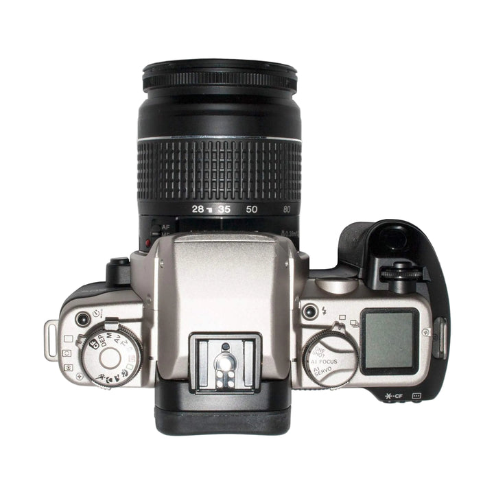 ClubCamera Canon EOS Elan IIE silver film camera top view with mode dial and AI FOCUS selector