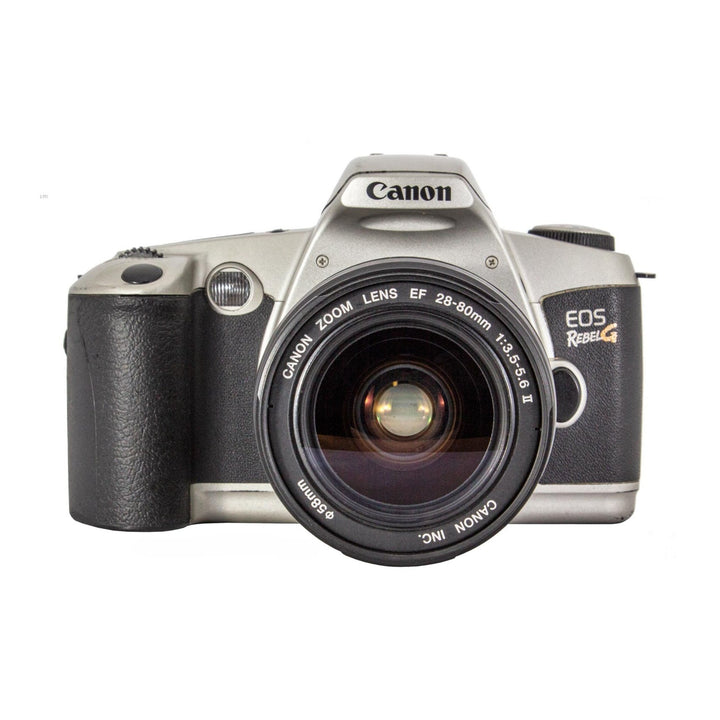 Front view of silver Canon EOS Rebel G film camera with textured grip and 28-80mm lens available at ClubCamera.com