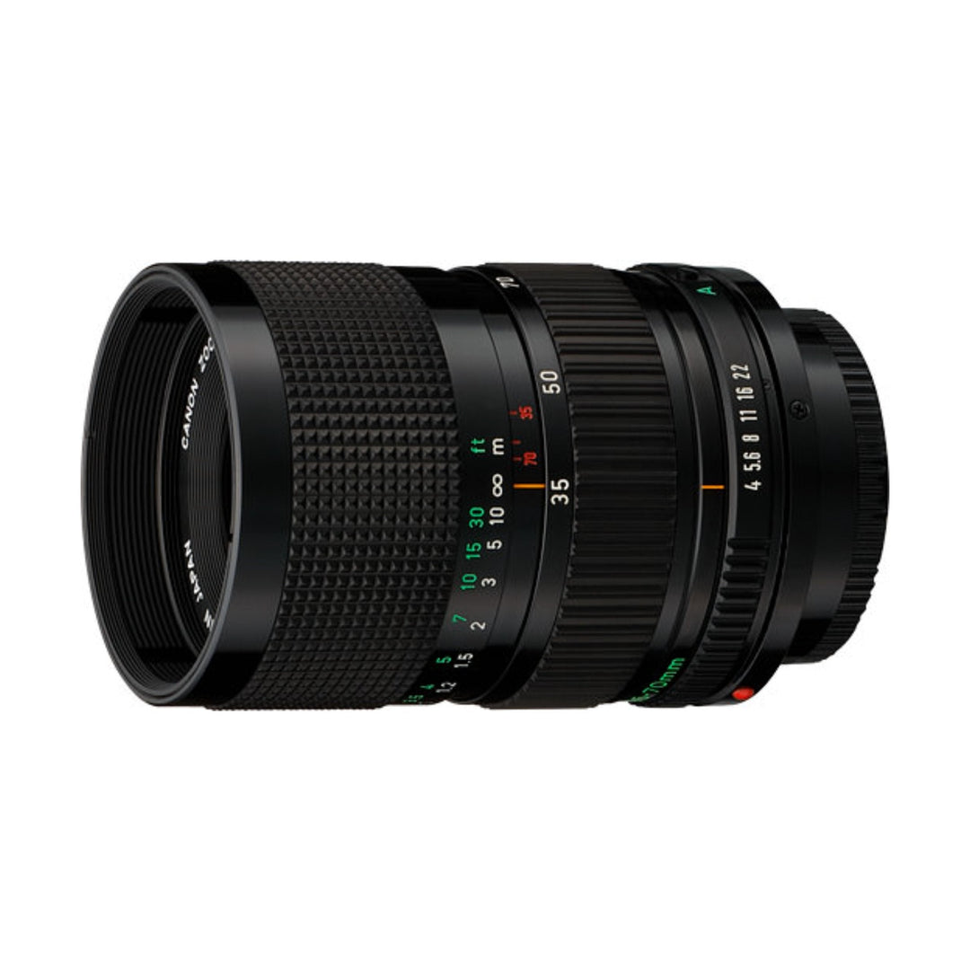 Canon FD 35-70mm f/4 MF Zoom Lens side profile with green markings and red aperture values at ClubCamera.com