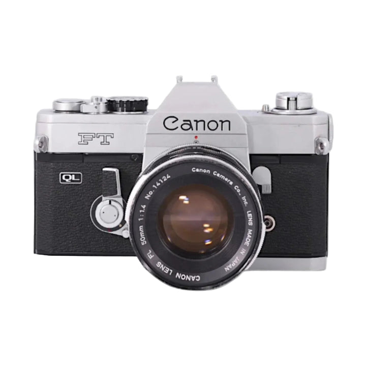Canon FT-QL 35mm SLR film camera with 50mm FL lens at ClubCamera.com, silver chrome body with black leatherette grip