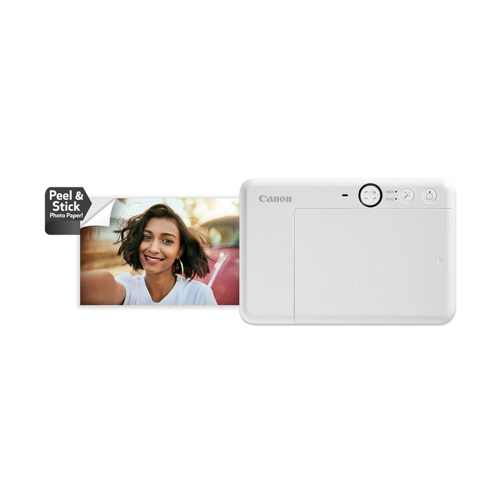 White Canon Ivy Cliq2 instant camera with matte finish and peel-and-stick photo paper at ClubCamera.com