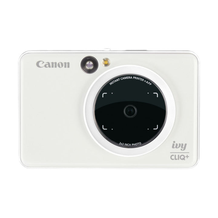 Front of Canon Ivy Cliq Plus Pearl White instant photo printer showing lens and 2x3 inch label at ClubCamera.com
