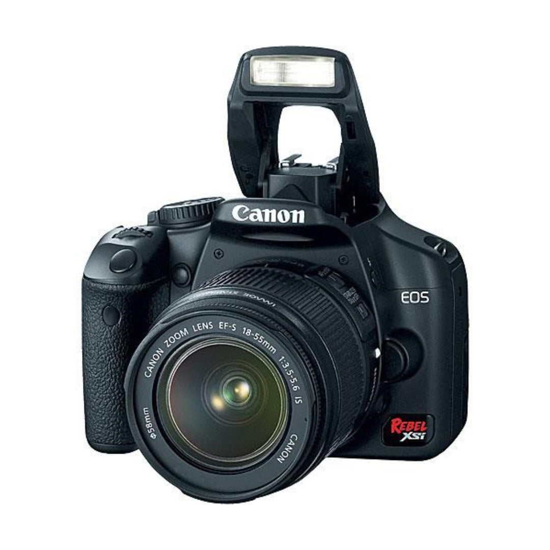Black Canon EOS Rebel XSi with raised pop-up flash and grip detail from ClubCamera.com