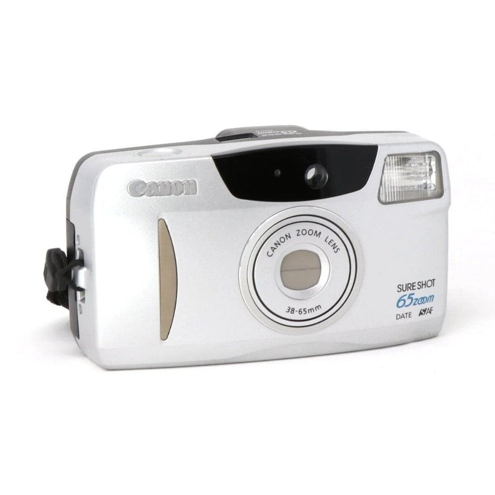 ClubCamera Canon Sure Shot 65 Zoom Date 35mm film camera front shot with silver body and zoom lens