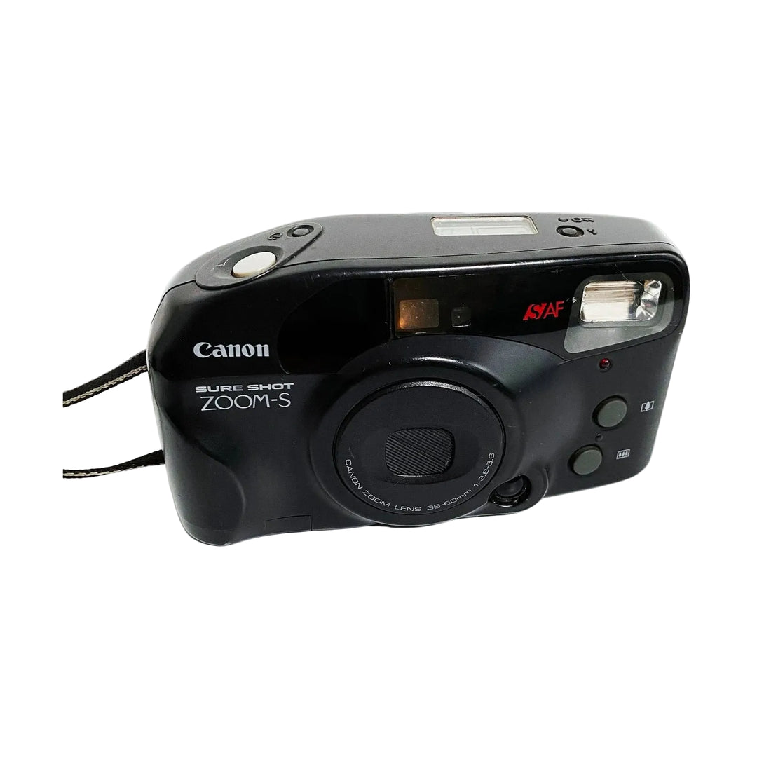 Glossy black Canon Sure Shot Zoom-S 35mm film camera with zoom lens cap and control buttons at ClubCamera.com