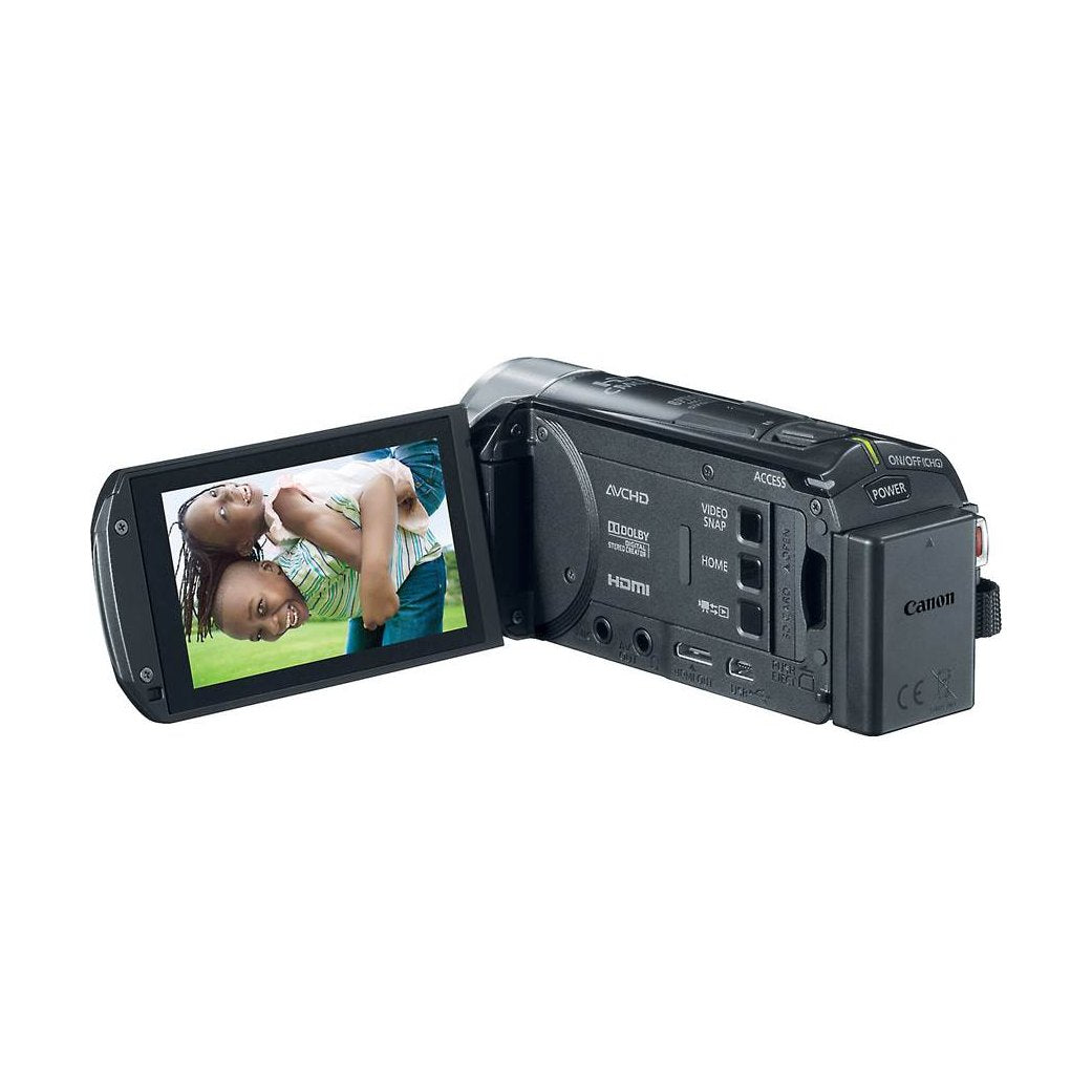 Black Canon VIXIA HF R30 camcorder rear view with flip-out LCD showing children, ClubCamera.com