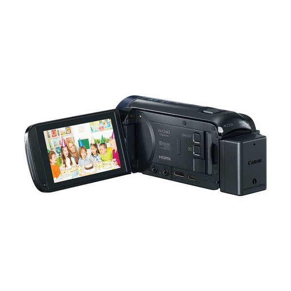 Black Canon VIXIA HF R60 camcorder rear view with flip-out LCD showing family party recording at ClubCamera.com