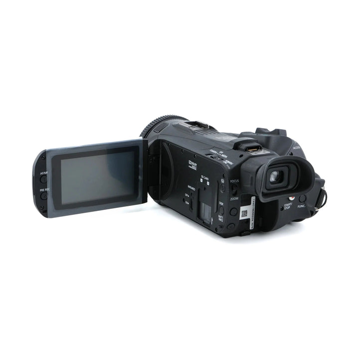 Black Canon XA11 camcorder rear view with extended LCD and labeled AF/MF buttons at ClubCamera.com