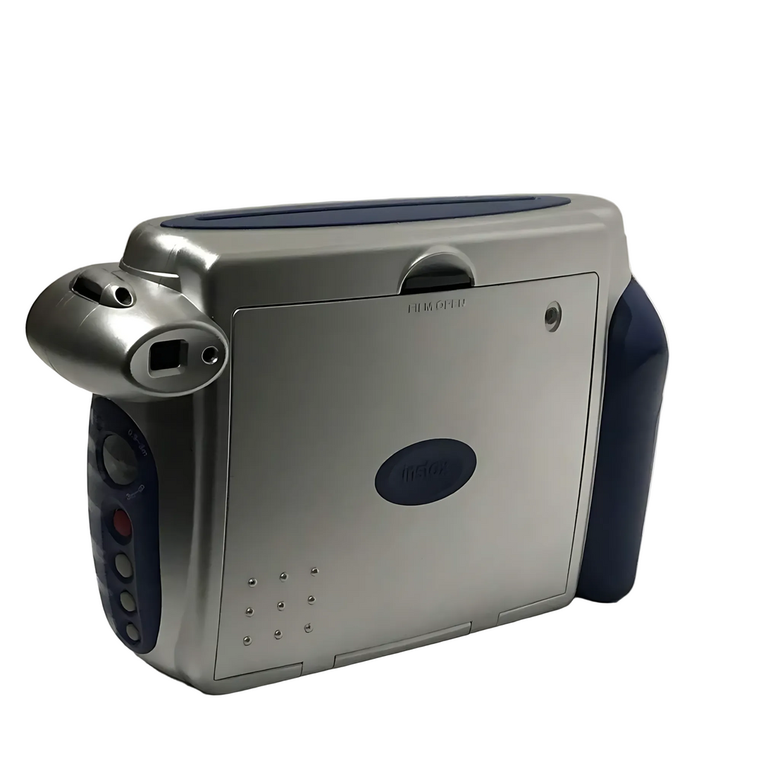 Rear view of silver and navy blue Fujifilm INSTAX Wide 200 instant camera at ClubCamera.com showing rubberized grip and brushed metal texture