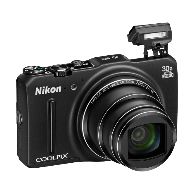 Black Nikon Coolpix S9700 with raised pop-up flash and extended zoom lens showing mode dial by ClubCamera.com
