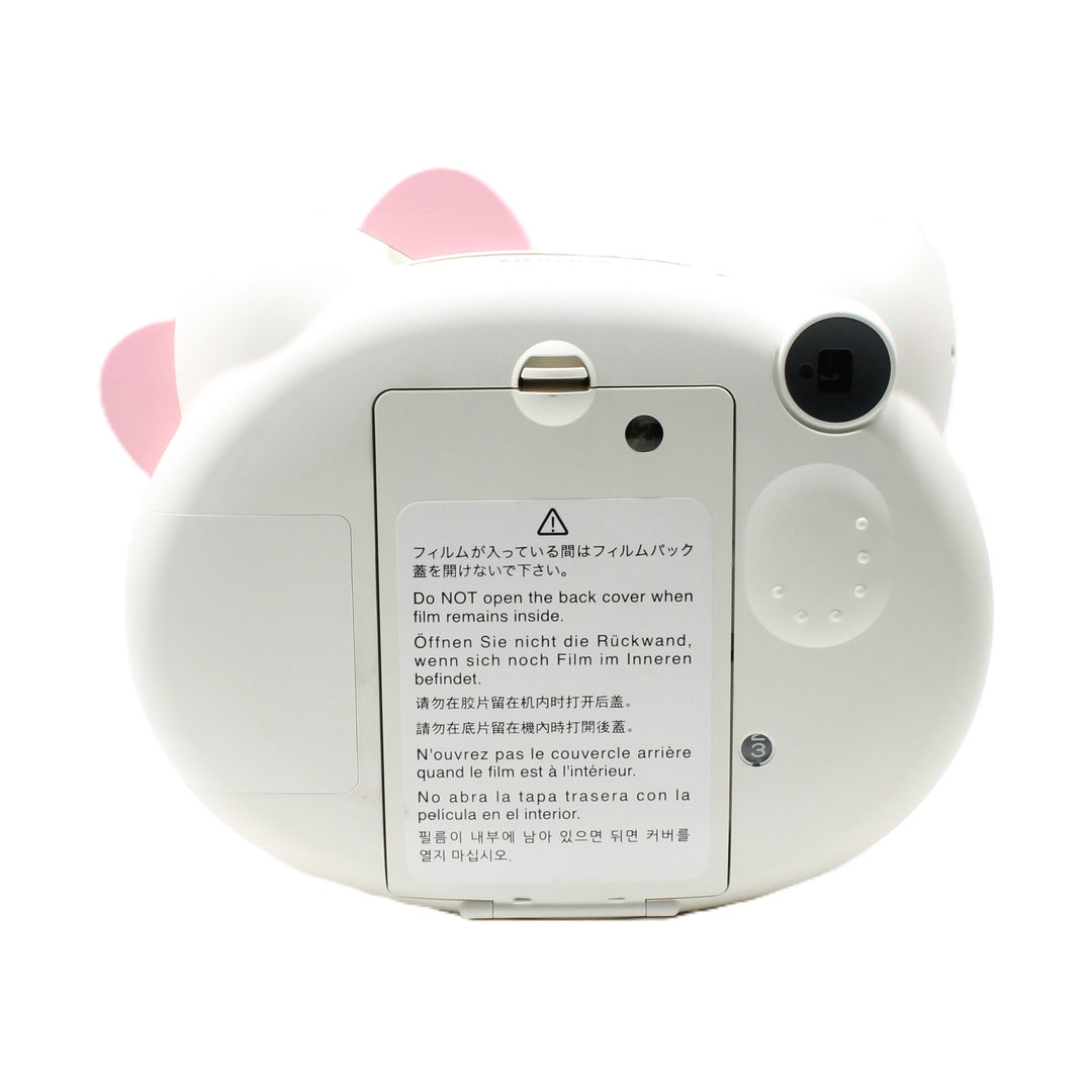 Fujifilm Instax mini HELLO KITTY camera rear view with white matte body and pink cat ears at ClubCamera.com