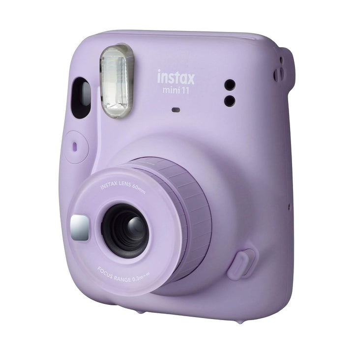 Fujifilm Instax Mini 11 lilac front angle showing built-in flash, lens ring grip, and focus range at ClubCamera.com