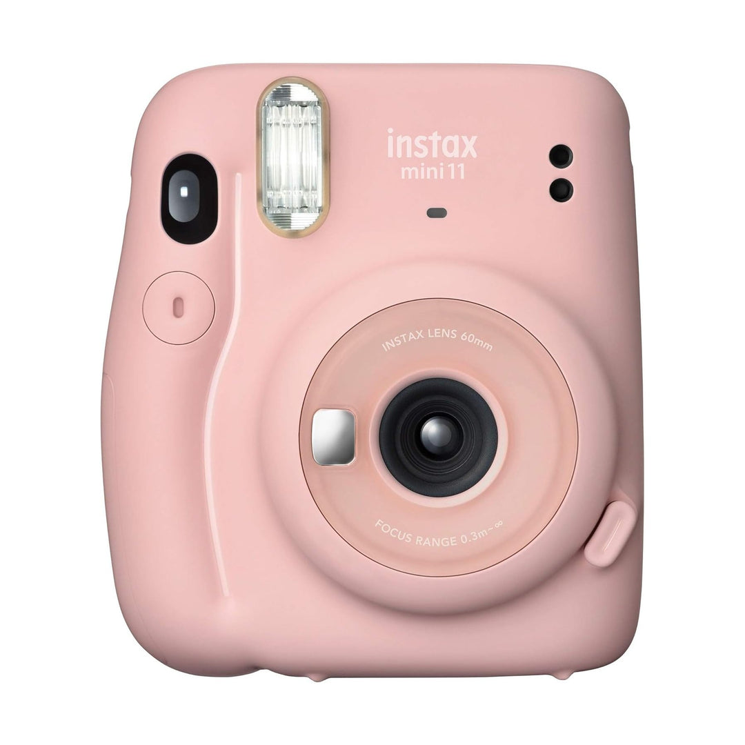 Centered matte blush pink Instax Mini 11 instant camera with white branding and silver shutter button by ClubCamera.com