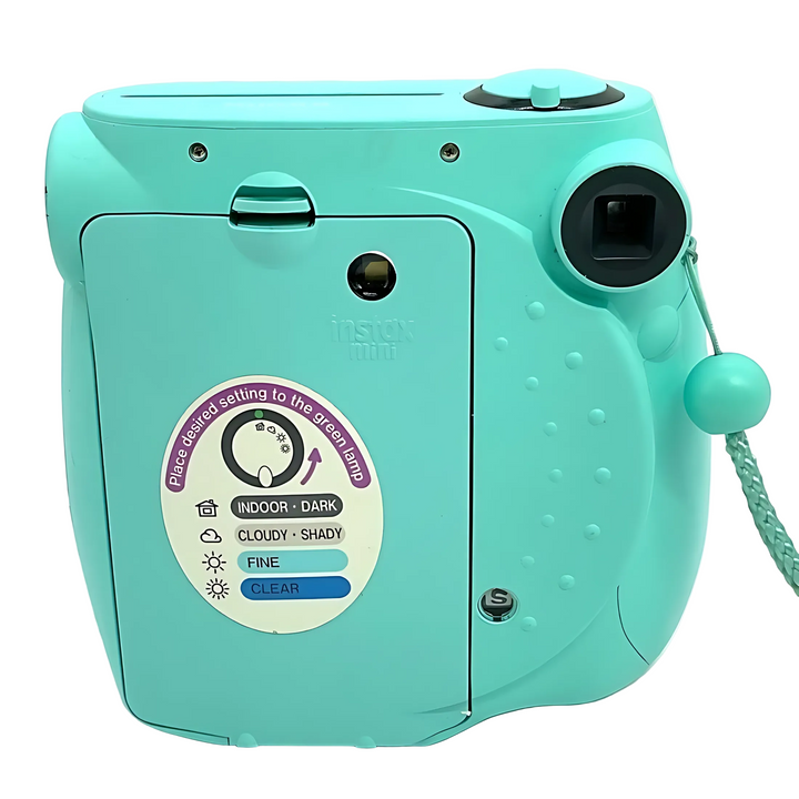 Rear view of Seafoam Green Fujifilm Instax Mini 7S showing brightness dial settings at ClubCamera.com