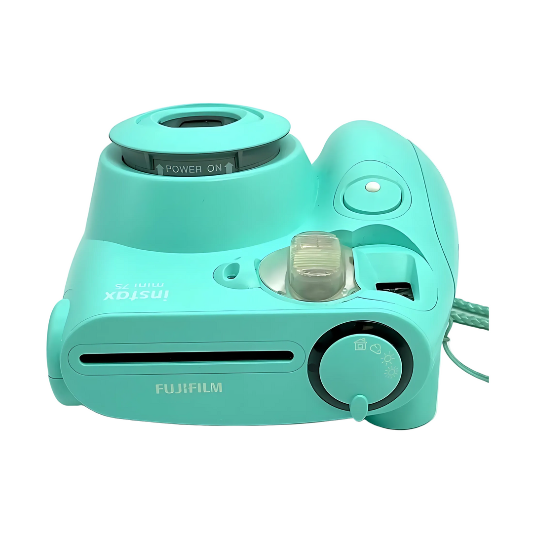 Top angled shot of Seafoam Green Fujifilm Instax Mini 7S power switch and viewfinder at ClubCamera.com