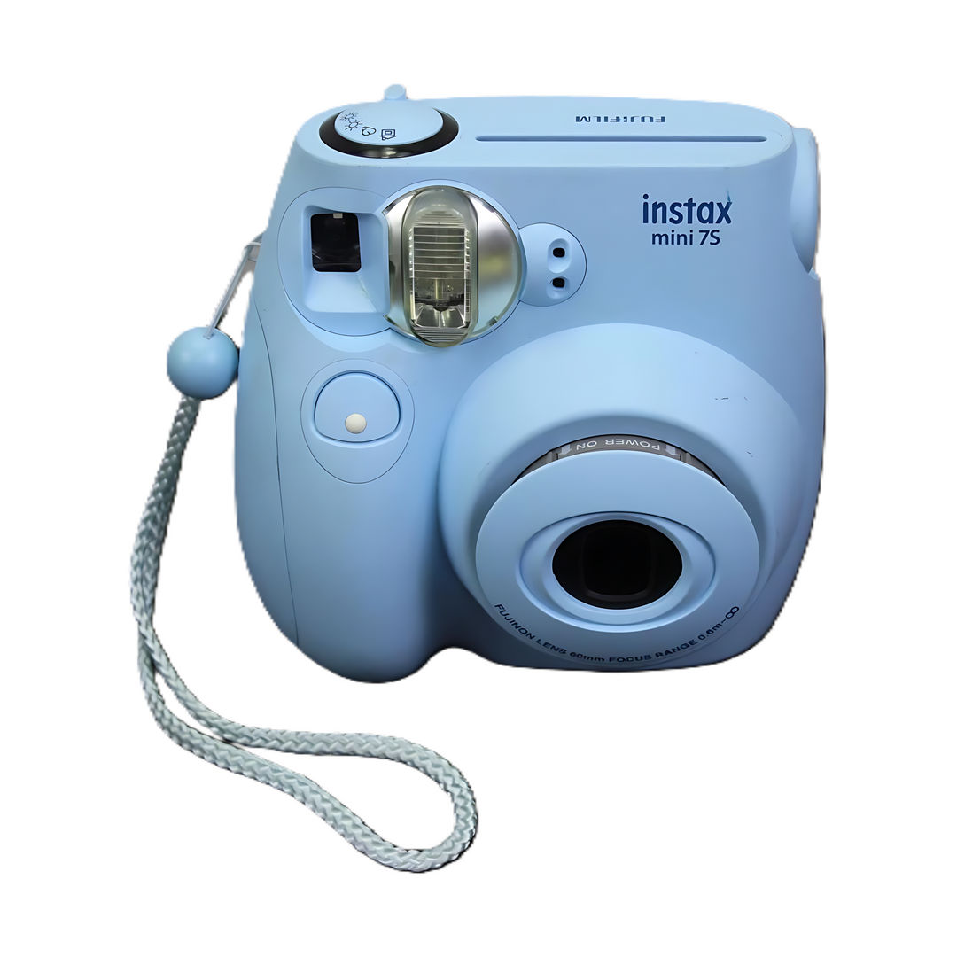 Top view of light blue Fujifilm Instax Mini 7S showing mode dial and power switch at ClubCamera.com