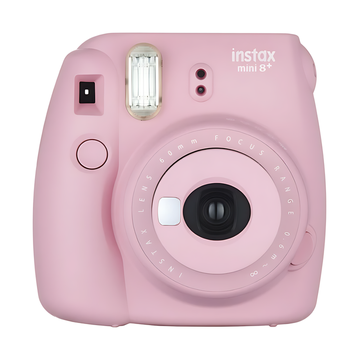 Strawberry pink Fujifilm Instax Mini 8+ front view showing film eject slot and focus ring from ClubCamera.com