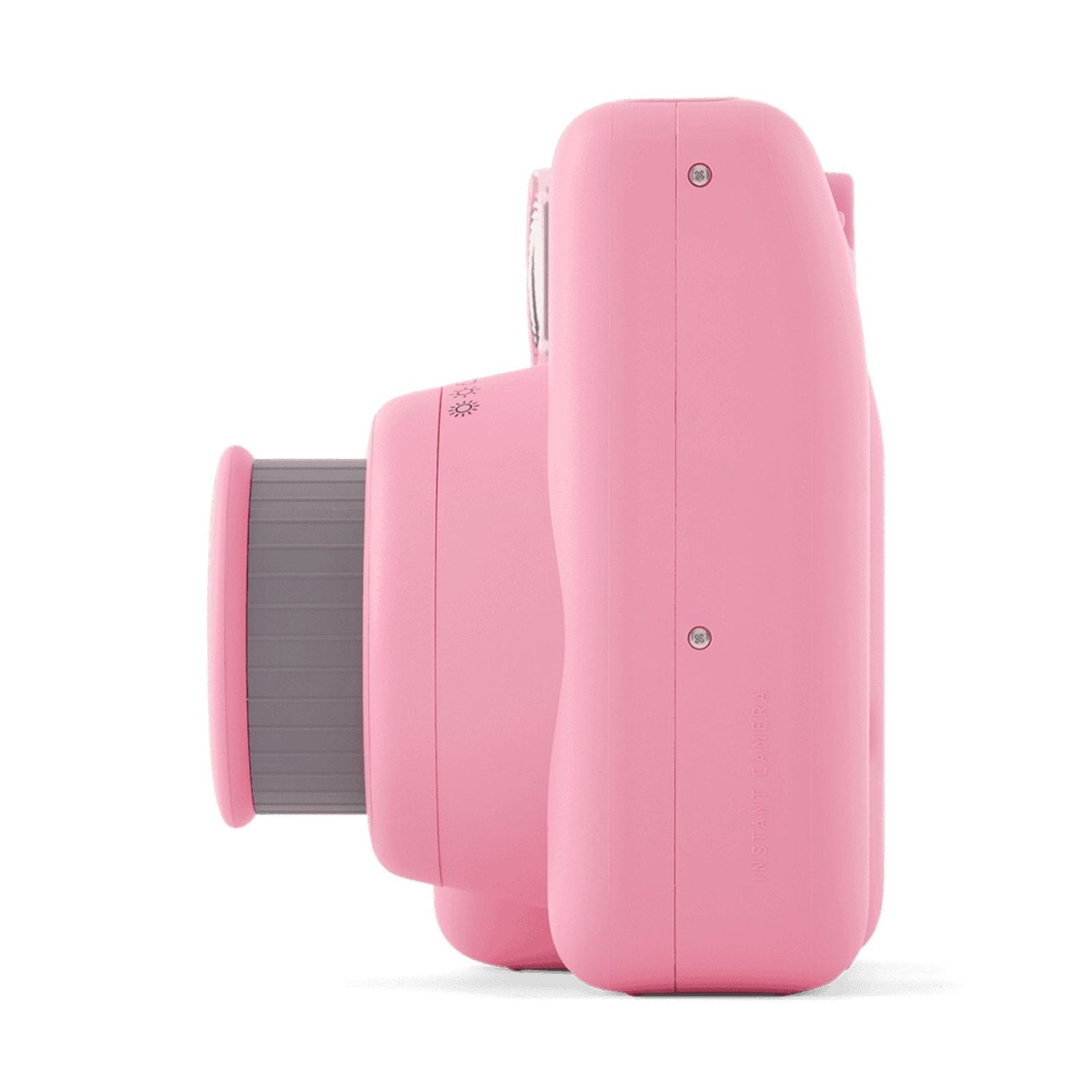 Side profile of pink Fujifilm INSTAX Mini SE showing ergonomic grip, textured zoom ring, and 'INSTANT CAMERA' embossing from ClubCamera.com