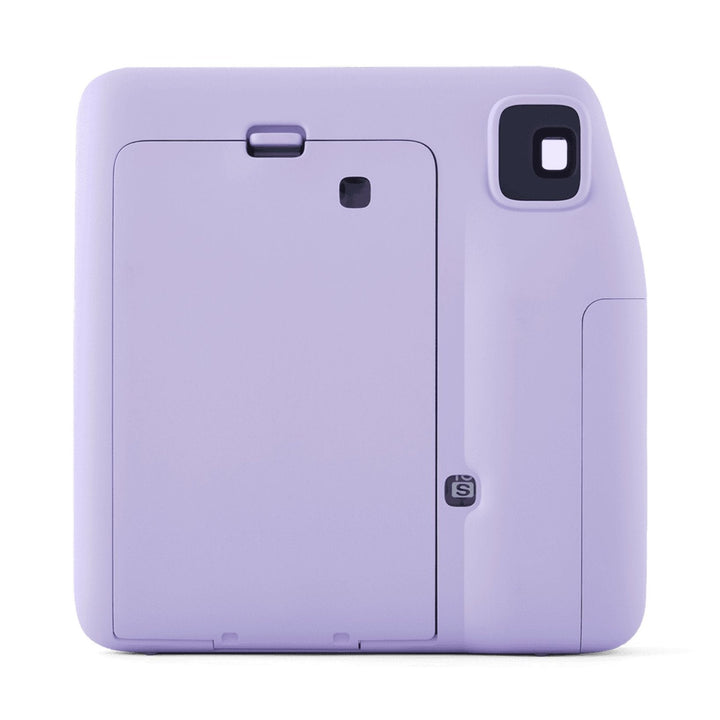 Back view of Fujifilm INSTAX Mini SE instant camera showing film compartment door and S mode button in lavender purple by ClubCamera.com