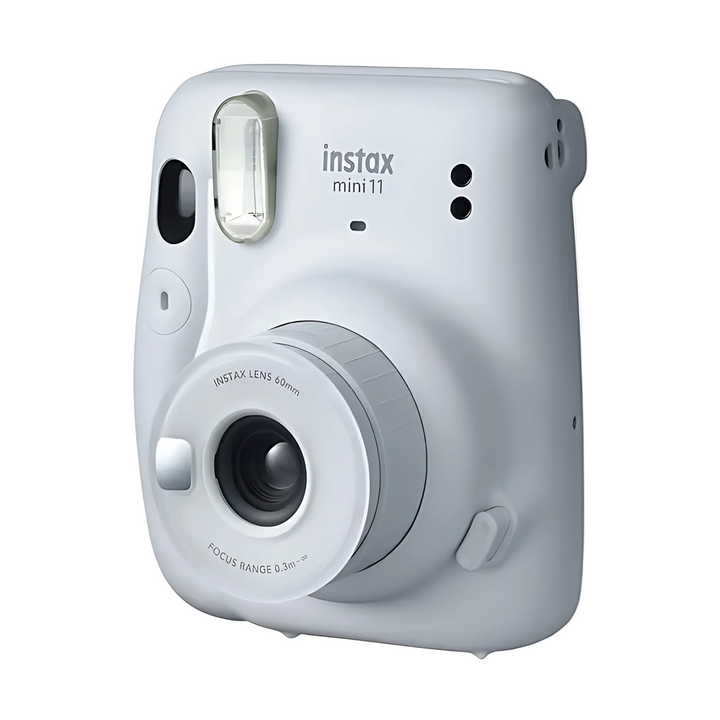 Fujifilm Instax Mini 11 Ice White instant camera front-left view with lens and flash at ClubCamera.com