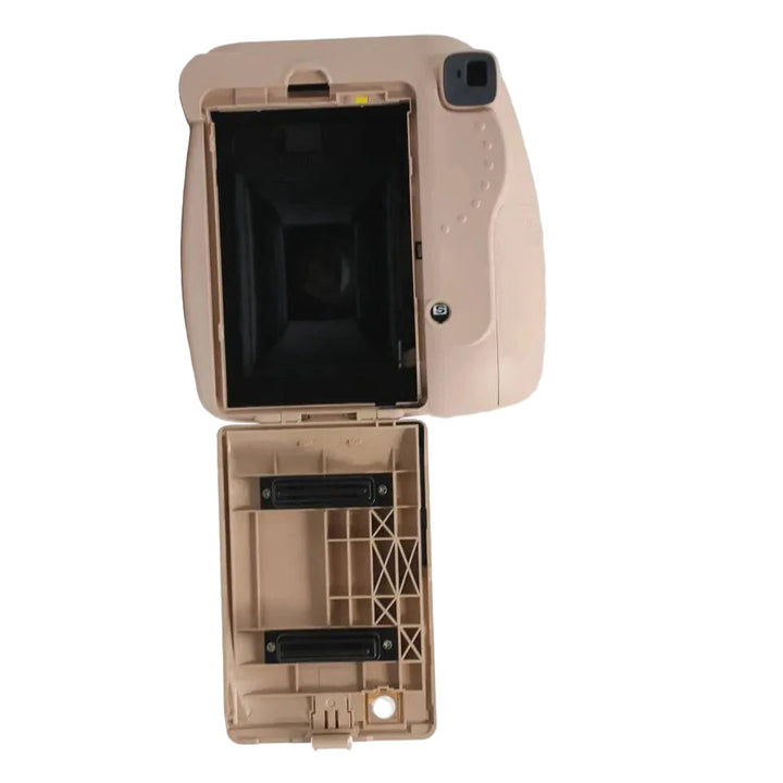 Fujifilm Instax Mini 8+ Cocoa open rear view showing film compartment and internal ribs at ClubCamera.com