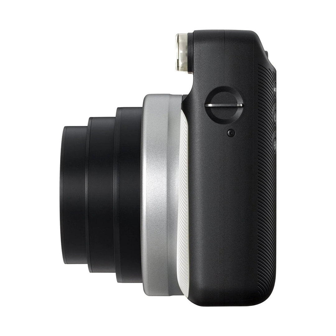 Angled shot of Fujifilm INSTAX Square SQ6 Pearl White highlighting extended lens barrel, silver mid-section, and rear grip texture at ClubCamera.com