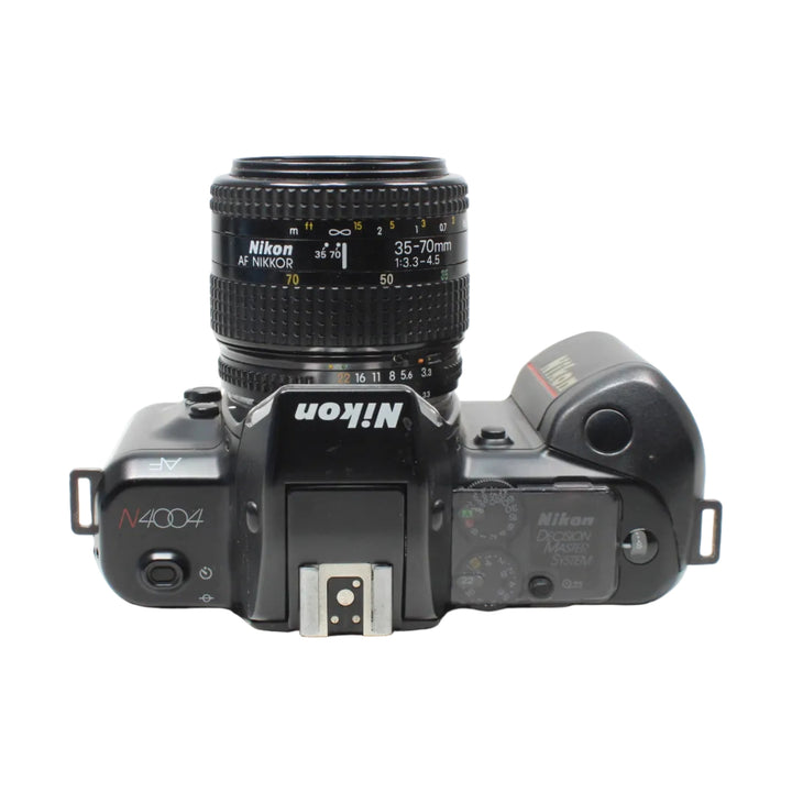 Top view of black Nikon N4004 showing Decision Master System window and mode dials from ClubCamera.com