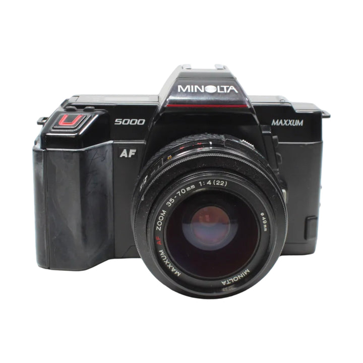 Front shot of classic black Minolta Maxxum 5000 35mm SLR film camera kit with AF zoom lens by ClubCamera.com